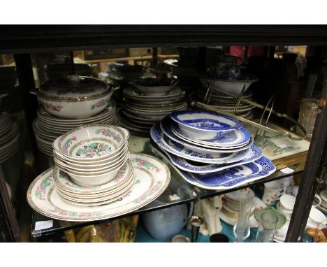 A large shelf of decorative china, glassware etc.