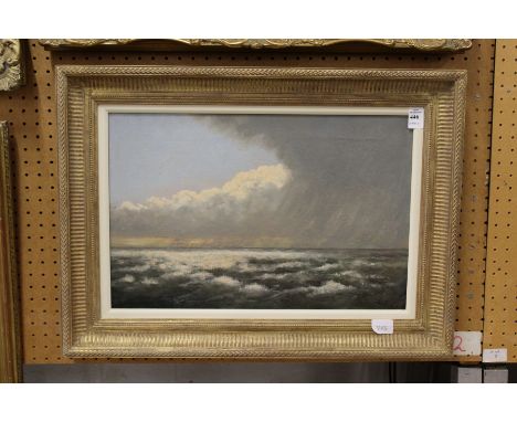 'Moody Seascape' oil on canvas, in a decorative frame.