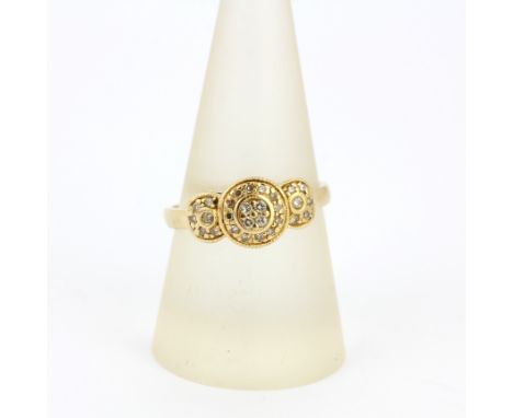 A 14ct yellow gold diamond set triple cluster ring, ring size R.5. Approx. 2.8gr.