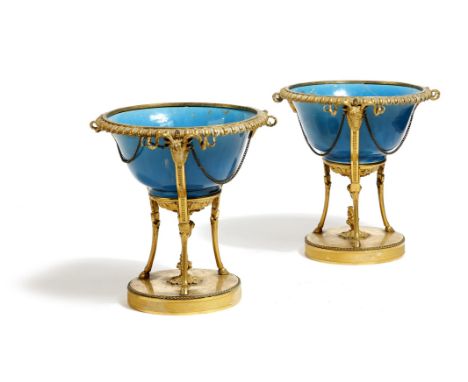 A pair of French ormolu and turquoise porcelain mounted tazza in Louis XVI style, each in the form of an athénienne with a mo