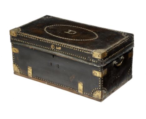 A 19th century camphorwood and leather trunk, with brass studs, the lid with an oval panel, with the initial 'D', the interio