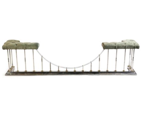 A modern white metal and brass club fender, with button upholstered green suede leather seats, 53.3cm high, 217.5cm wide, 36.
