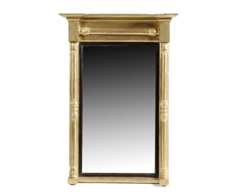 A William IV giltwood pier mirror, with a rectangular plate within a reeded ebonised slip and a lappet carved baton frame, 78