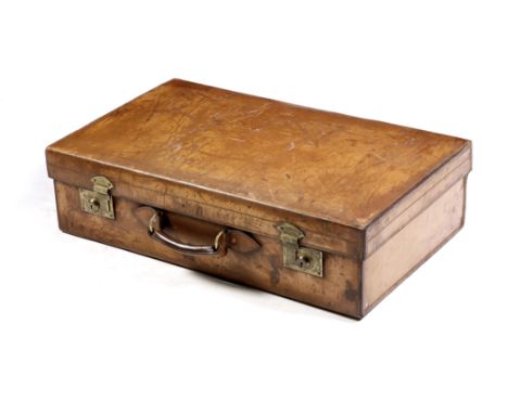 A brown leather suitcase by Maxwell, with brass locks and stamped with initials 'J. R. H. H.' and 'MAXWELL. 8. DOVER ST. LOND