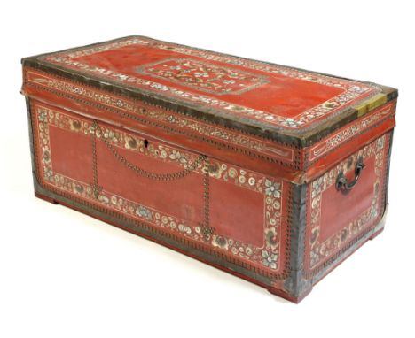 A 19th century Chinese camphorwood and red leather trunk, with brass mounts and painted with bands of flowers and leaves, wit