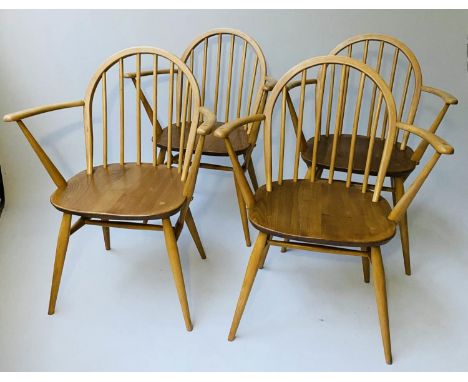 ERCOL WINDSOR DINING CHAIRS, a set of four elm stick hoop back armchairs with solid seats (all labelled), 60cm W x 96cm H. (4