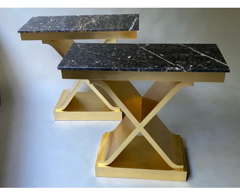 CONSOLE TABLES, a pair,  88cm x 36cm x 80cm H, bespoke gold leaf X form supports, black/gold marble tops. (2) 