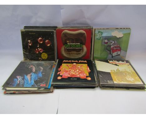 A box of mixed LPs and 12" singles including Hawkwind, Black Sabbath, The Stills-Young Band, Television, Ted Nugent, Ten Year