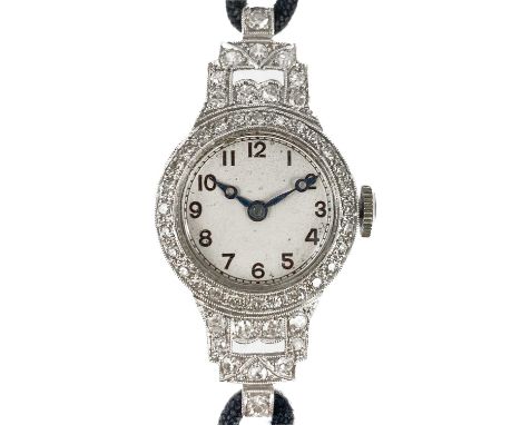 An Art Deco platinum and diamond cased lady's manual wind wristwatch. The silvered 17mm dial with black Roman numerals and mi