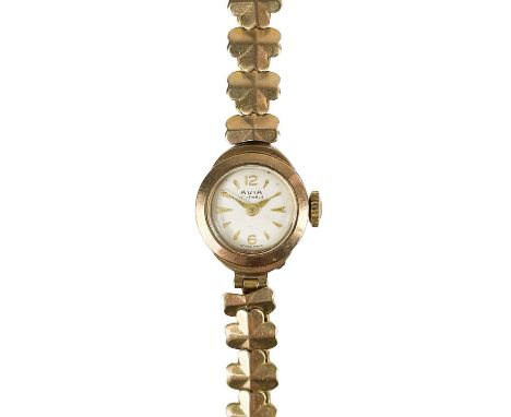 An Avia 1960's 9ct gold lady's manual wind bracelet wristwatch.   The 12mm signed dial with gilt hour markers, 15 jewel movem