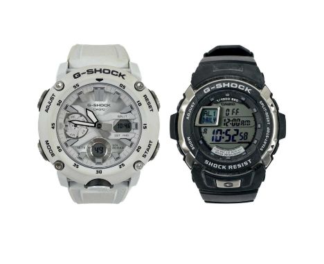 Two G-Shock Casio gentleman's quartz wristwatches, models 3095 & 5590. Refs. G-7700-1ER and GA-2000S-7AER, box and papers.Bot