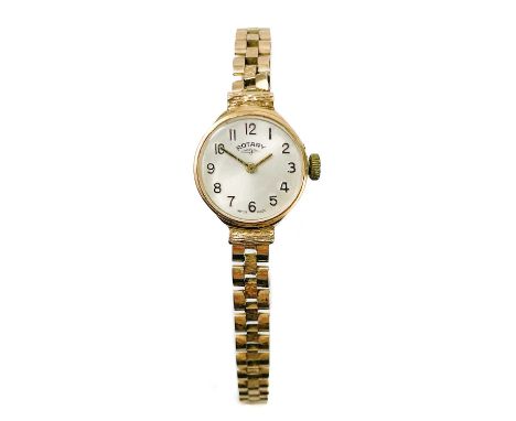 A Rotary 9ct gold lady's manual wind bracelet wristwatch. The 17mm signed silvered dial with black Arabic numerals, the case 