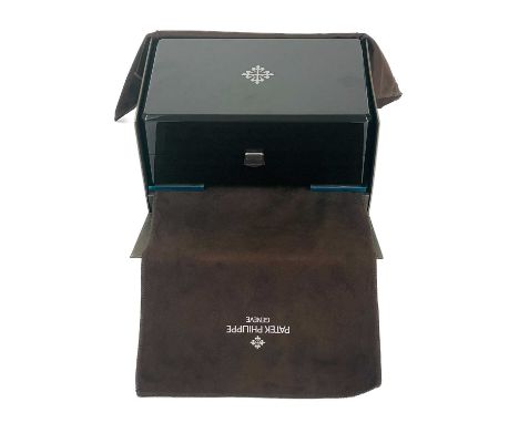 A Patek Philippe wristwatch box. With fitted interior, fabric cover and outer box, width of inner box 23.5cm.