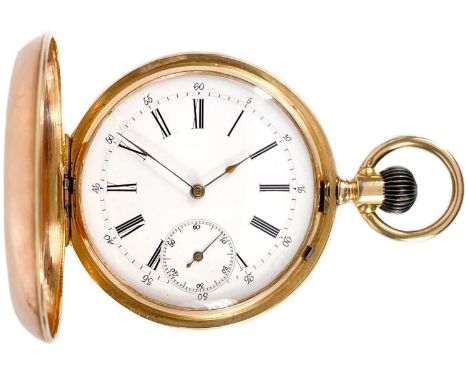 An unusual rose gold cased full hunter crown wind double side calendar pocket watch.  The reverse dial with exhibition back w