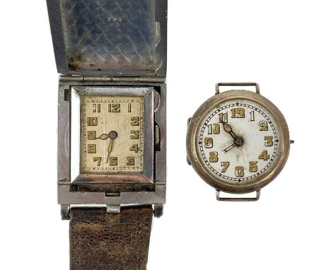 A silver-cased WWI period wire lug trench wristwatch. Import marks for Birmingham 1918, the 23mm white dial with luminous Ara