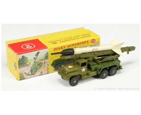 Dinky Military 665 Honest John Missile Launcher - finished in green including plastic platform and hubs, comes with white and