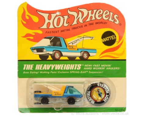 Hot Wheels (Mattel) Redline - "The Heavyweights" 6450 Tow Truck - metallic blue, yellow plastic back with white boom, metal h