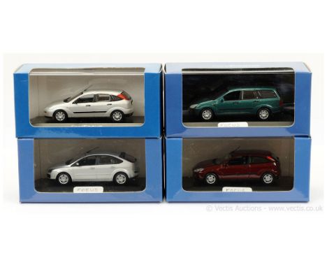 Minichamps (1/43 Scale) a group of Ford Focus Models to include (1) - (1998) - silver; (2) same as (1) but metallic maroon; (