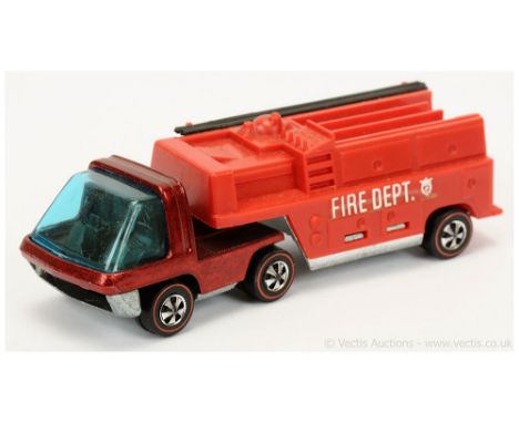 Hot Wheels (Mattel) Redline Heavyweights - 6454 Articulated Fire Engine - finished in metallic red cab unit with blue tinted 