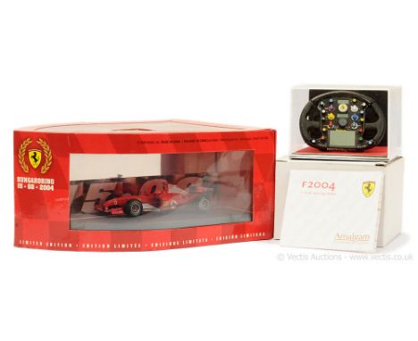 Amalgam "Ferrari F1 F2004 (1/4 Scale) Steering Wheel - condition is Mint including rigid perspex cases and packing pieces - c