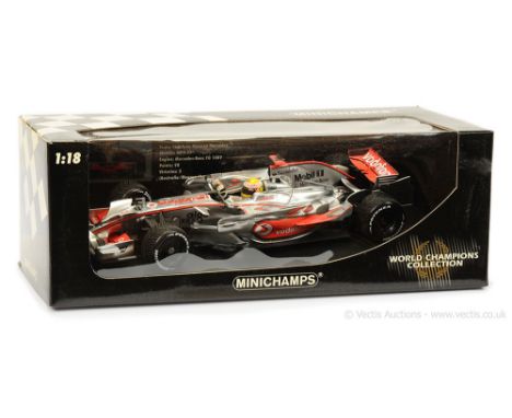 Minichamps (1/18 Scale) McLaren Mercedes MP4-23 "Lewis Hamilton World Champion 2008" - finished in chrome with red "Vodafone"