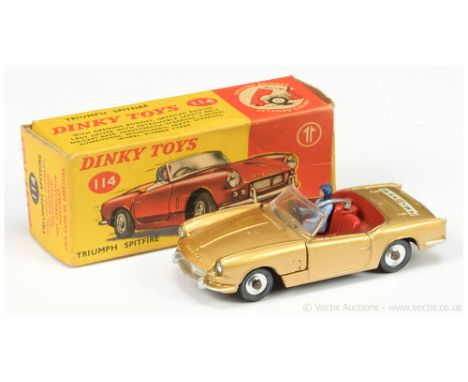 Dinky 114 Triumph Spitfire Sports Car "I've Got a Tiger in My Tank" - gold body, red interior with plastic figure driver, sil