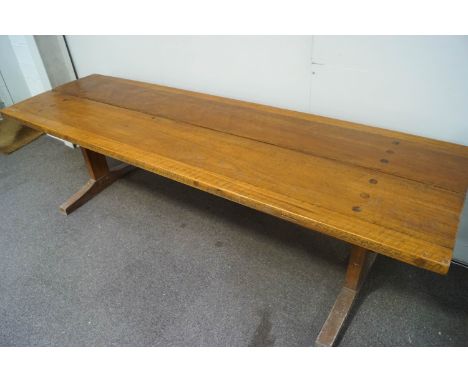 A refectory table and two matching bench seats by Geoffrey Juniper, 75cm high x 255cm long x 79cm deep