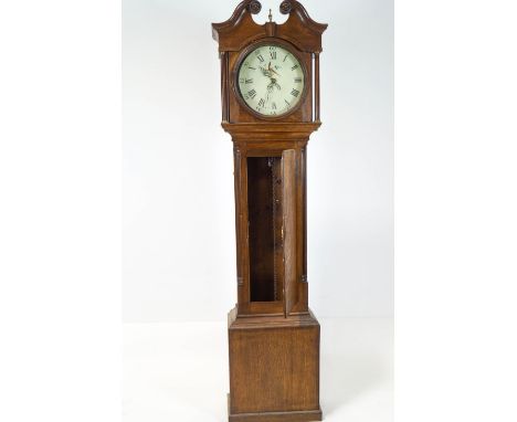 An early 19th century longcase clock, the oak case enclosing a round white painted dial and 30 hour movement, 209cm high