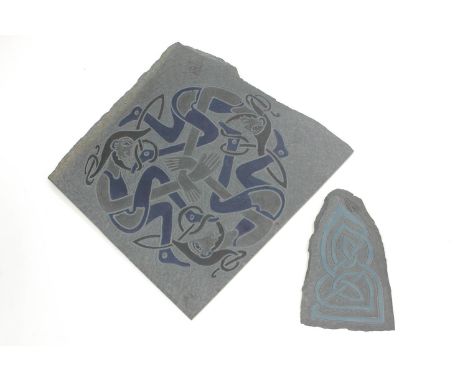 Two 20th century slate plates, engraved with Celtic designs, the largest 32cm x 30.5cm