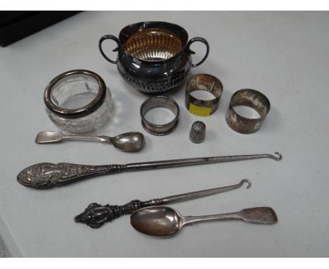 Parcel of mixed silver items including a twin handled sugar basin, napkin rings, spoons etc