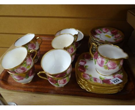 Royal Albert rose decorated part teaset Condition report: All eleven saucers are good, all six side plates are good, cream ju