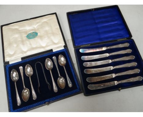 Cased set of six silver tea knives together with a cased silver spoon and tong set