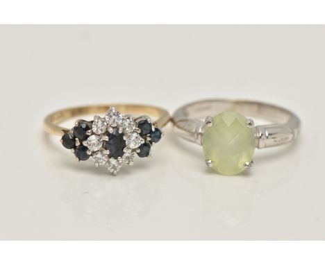 TWO 9CT GOLD GEM SET RINGS, the first a sapphire and colourless cubic zirconia cluster ring, set in a white metal mount, pinc