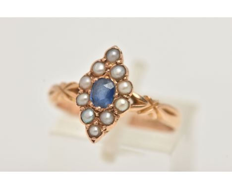 AN EARLY 20TH CENTURY SAPPHIRE AND SPLIT PEARL, 15CT GOLD RING, of a marquise form set with a central oval cut blue sapphire,