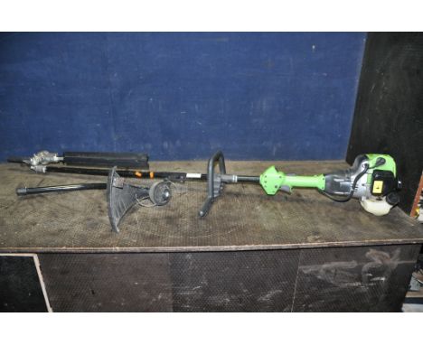 A 'THE HANDY' THMC-A PETROL POLE CHAINSAW, with strimmer attachment (engine pulls freely but hasn't started)