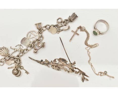 A SMALL BAG OF WHITE METAL JEWELLERY, a silver curb link bracelet, links stamped with sterling marks, multiple charms in form