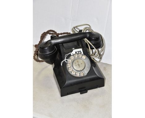 A G.P.O. MODEL 312 BAKELITE ROTARY DIAL TELEPHONE, c.1950s, fitted with a type 164 handset, phone complete with pull-out dire