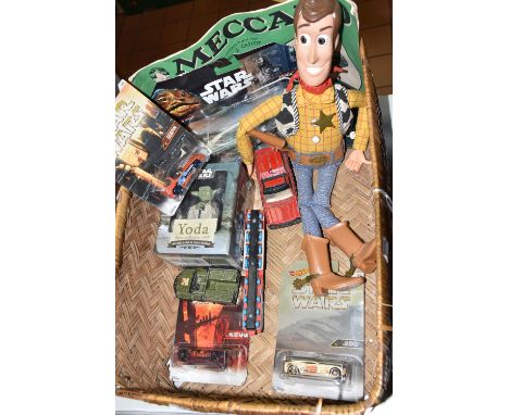 A QUANTITY OF ASSORTED TOYS, to include Mattel Hot Wheels Star Wars cars, still sealed on original backing cards, which have 