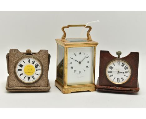 A BRASS CARRIAGE CLOCK AND TWO TRAVEL CLOCKS, the first a rectangular form carriage clock signed 'Goldsmiths &amp; Silversmit
