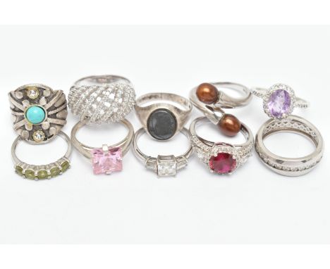 TEN SILVER AND WHITE METAL RINGS, to include a silver and hematite Centurian intaglio signet ring, hallmarked Birmingham, rin