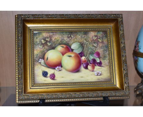 A FRAMED ROYAL WORCESTER FALLEN FRUITS HAND PAINTED PLAQUE, painted with apples, cherries and blackberries in a naturalistic 