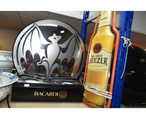 TWO BACARDI BAR DECORATIONS consisting a Bacardi Breezer sign 70cm height 52cm, a Bacardi partially frosted mirror with drink