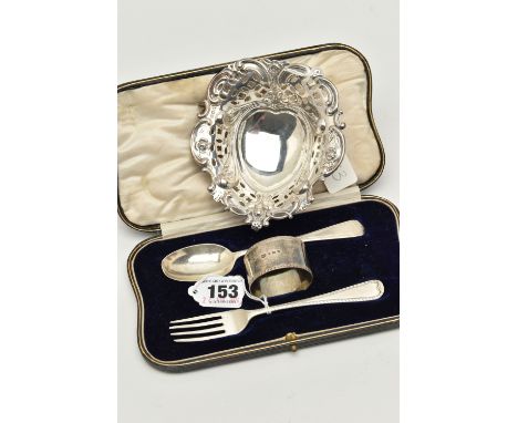 A CASED EARLY 20TH CENTURY SILVER CHRISTENING SET AND A LATE VICTORIAN SILVER BON BON DISH, the christening set containing a 