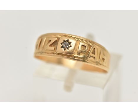 AN EARLY 20TH CENTURY, 18CT GOLD 'MIZPAH' RING, with a star set rose cut diamond, hallmarked 18ct Birmingham 1901, ring size 