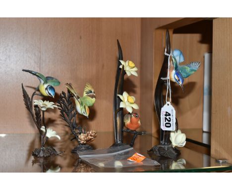 A GROUP OF FOUR ROYAL WORCESTER ORNAMENTAL STUDIO MODELS, Garden Bird collectables, mounted on bronze, comprising a robin amo