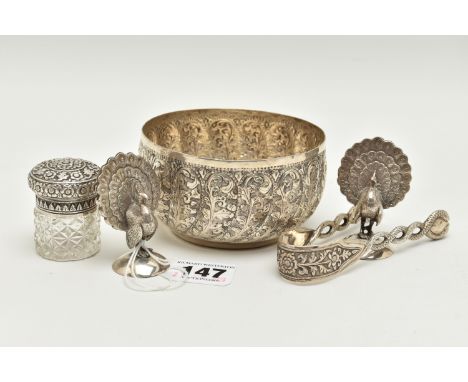 A SMALL GROUP OF LATE 19TH/20TH CENTURY INDIAN WHITE METAL, comprising a circular sugar bowl with gadrooned and repoussé foli