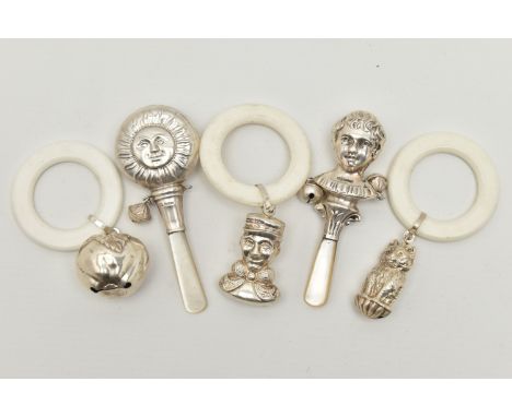 FIVE SILVER BABY RATTLES, to include a silver apple rattle, hallmarked 'Quarrier Ward Ltd' Birmingham 1999, with teething rin
