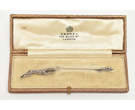 AN EARLY 20TH CENTURY DIAMOND STICK PIN BROOCH, designed as a greyhound chasing a hare, white metal front set with forty eigh