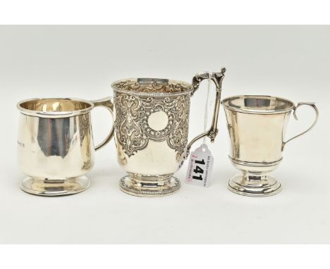 THREE VICTORIAN/20TH CENTURY SILVER CHRISTENING MUGS, comprising a Victorian example with beaded rims, repoussé and chased fo