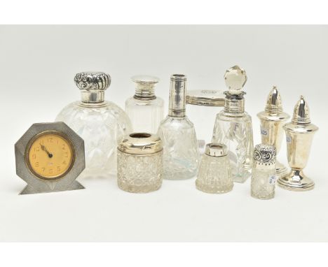 A BOX OF ASSORTED SILVER TOPPED TOILET JARS AND SCENT BOTTLES, to include a round glass scent bottle with pull off embossed d